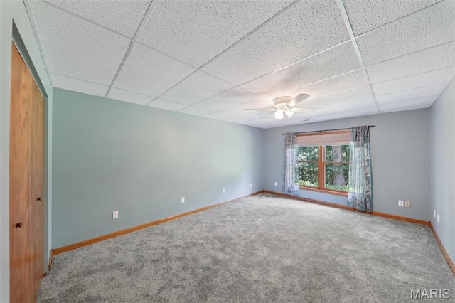 67 High Trails Dr, Eureka, MO 63025 - spare room featuring carpet, ceiling fan, and a paneled ceiling