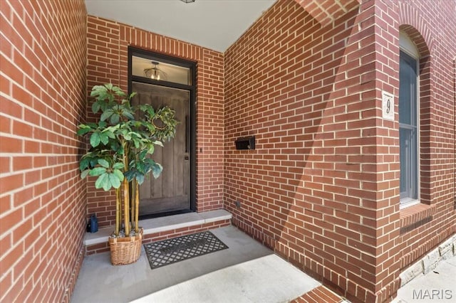 9 E Main St, Washington, MO 63090 - property entrance featuring brick siding