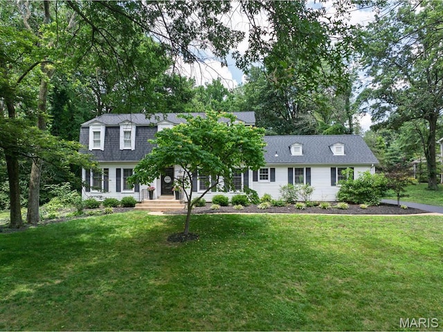 1855 Grassy Ridge Rd, Kirkwood, MO 63122 - view of front of home with a front yard and a shingled roof