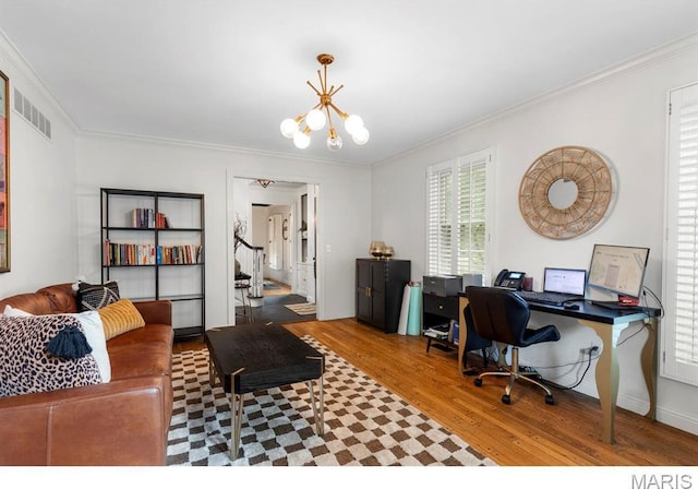 1855 Grassy Ridge Rd, Kirkwood, MO 63122 - office space with wood finished floors, ornamental molding, and a chandelier