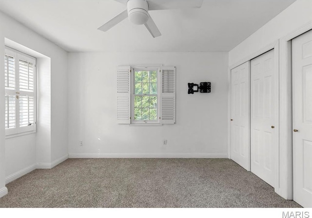 1855 Grassy Ridge Rd, Kirkwood, MO 63122 - unfurnished bedroom featuring carpet and ceiling fan