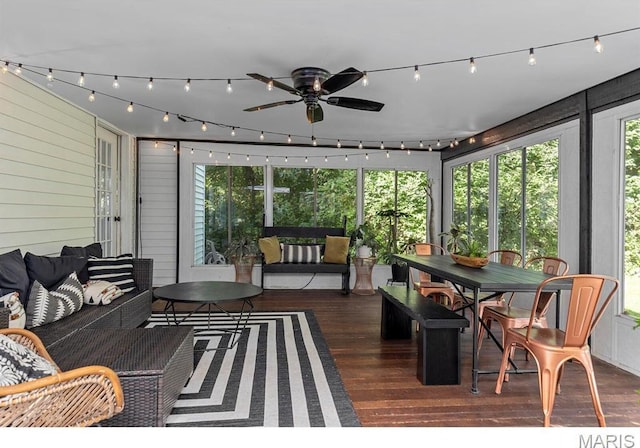 1855 Grassy Ridge Rd, Kirkwood, MO 63122 - sunroom / solarium featuring outdoor lounge area, outdoor dining space, wood finished floors, and a ceiling fan