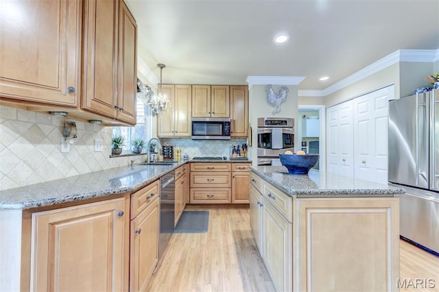2211 Viewroyal Dr, Des Peres, MO 63131 - kitchen featuring appliances with stainless steel finishes, ornamental molding, light wood-style flooring, light stone counters, and a kitchen island