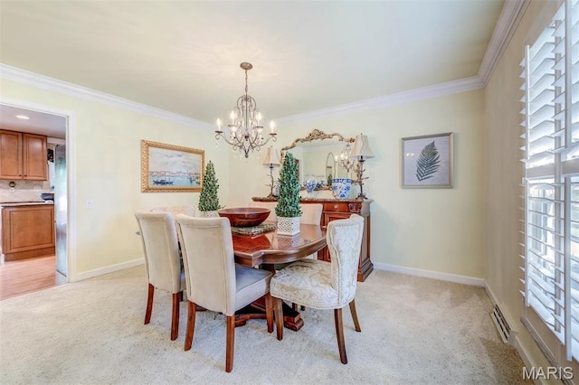 2211 Viewroyal Dr, Des Peres, MO 63131 - dining area featuring plenty of natural light, light carpet, a chandelier, and ornamental molding