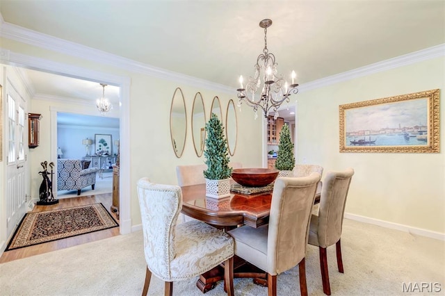 2211 Viewroyal Dr, Des Peres, MO 63131 - dining space featuring a chandelier, light colored carpet, and crown molding