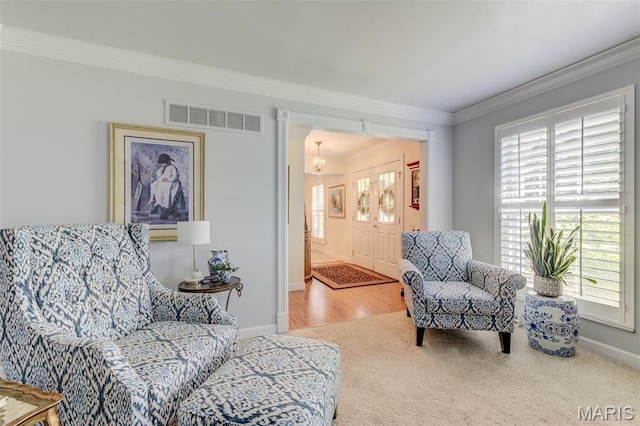 2211 Viewroyal Dr, Des Peres, MO 63131 - living area featuring crown molding, a chandelier, and carpet floors