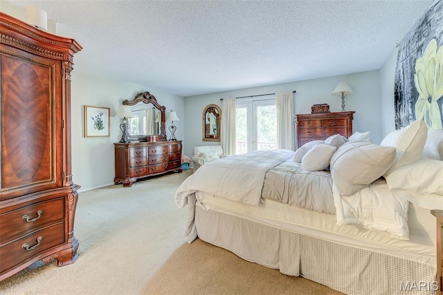 2211 Viewroyal Dr, Des Peres, MO 63131 - carpeted bedroom with a textured ceiling and french doors