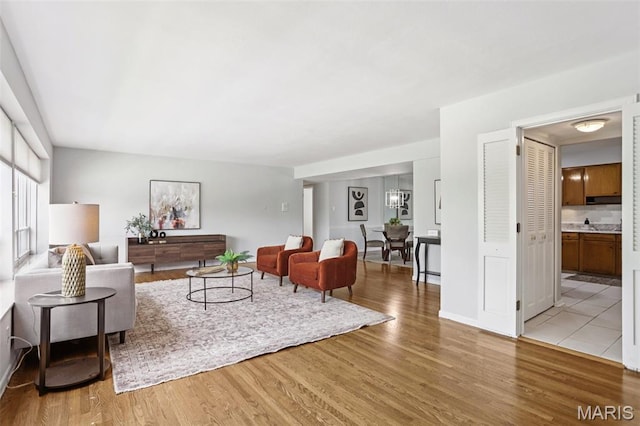 520 S Brentwood Blvd Unit 3A, Saint Louis, MO 63105 - living room featuring wood finished floors