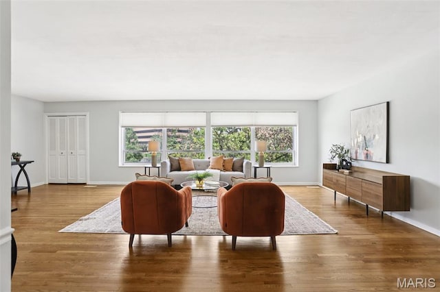 520 S Brentwood Blvd Unit 3A, Saint Louis, MO 63105 - living area featuring wood finished floors and baseboards