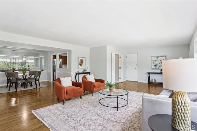 520 S Brentwood Blvd Unit 3A, Saint Louis, MO 63105 - living room with wood finished floors