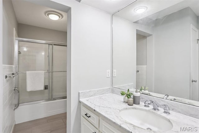 520 S Brentwood Blvd Unit 3A, Saint Louis, MO 63105 - bathroom with vanity and bath / shower combo with glass door