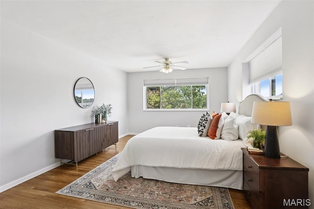 520 S Brentwood Blvd Unit 3A, Saint Louis, MO 63105 - bedroom with wood finished floors and a ceiling fan