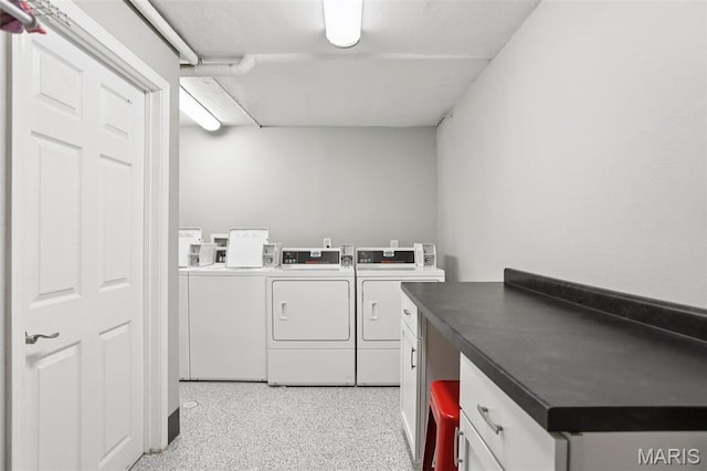 520 S Brentwood Blvd Unit 3A, Saint Louis, MO 63105 - laundry area featuring cabinet space and washing machine and clothes dryer