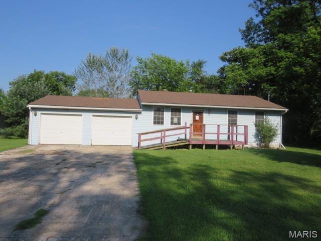5129 Rapp Rd, Granite City, IL 62040 - ranch-style house with a front lawn, driveway, and an attached garage