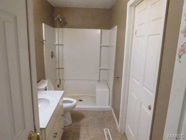 5129 Rapp Rd, Granite City, IL 62040 - bathroom featuring a shower stall, tile patterned floors, and vanity