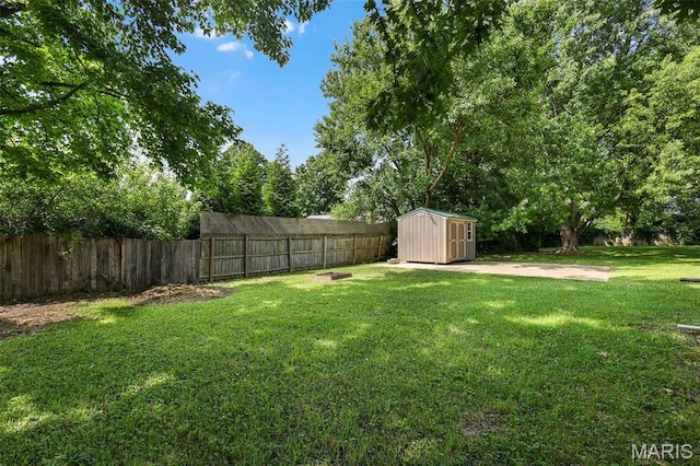 1016 Andra Dr, Maryville, IL 62062 - fenced backyard featuring a storage shed