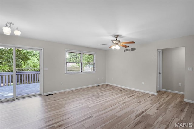1016 Andra Dr, Maryville, IL 62062 - spare room with light wood-style flooring and a ceiling fan