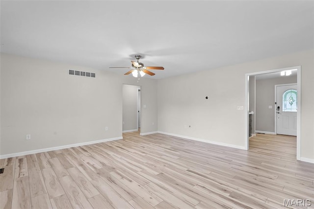 1016 Andra Dr, Maryville, IL 62062 - unfurnished room featuring a ceiling fan and light wood-style floors