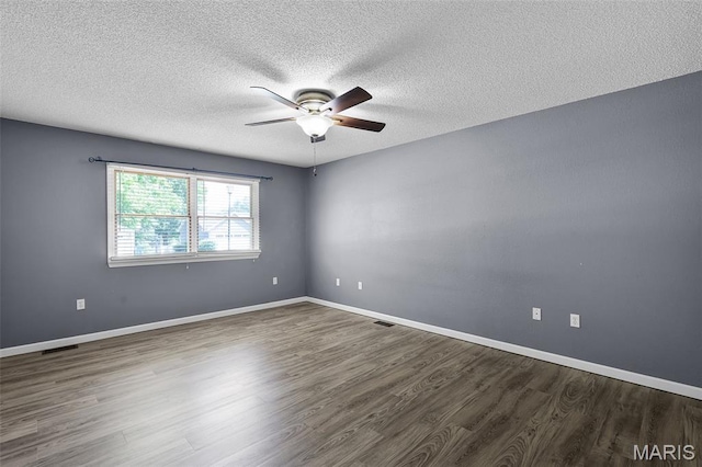 1016 Andra Dr, Maryville, IL 62062 - spare room featuring ceiling fan, wood finished floors, and a textured ceiling