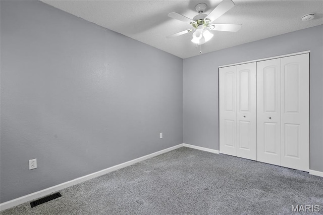 1016 Andra Dr, Maryville, IL 62062 - unfurnished bedroom with carpet floors, a closet, and ceiling fan