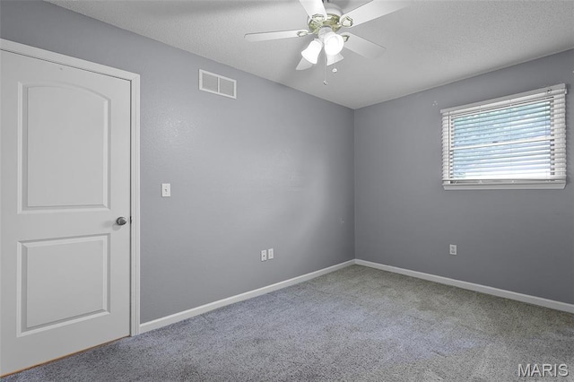1016 Andra Dr, Maryville, IL 62062 - carpeted empty room featuring a ceiling fan and baseboards