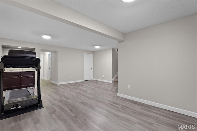 1016 Andra Dr, Maryville, IL 62062 - unfurnished living room featuring stairway and light wood-type flooring