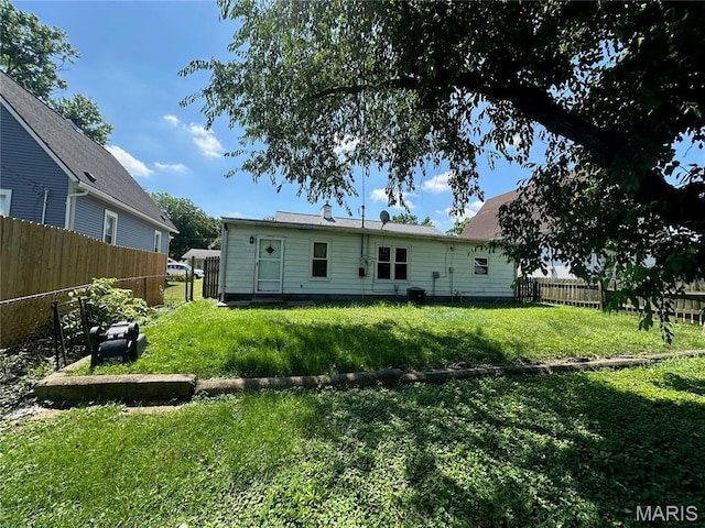 1325 Orchard St, Belleville, IL 62221 - back of house with a fenced backyard
