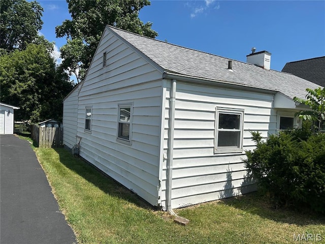 1325 Orchard St, Belleville, IL 62221 - view of home's exterior featuring a shingled roof