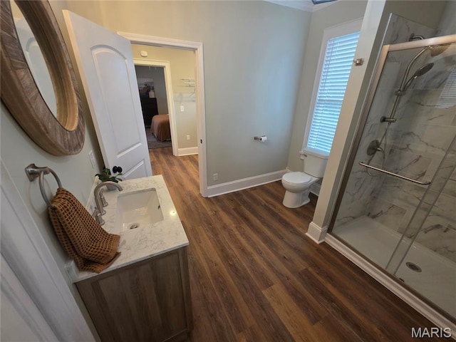 371 Jefferson St, Saint Genevieve, MO 63670 - bathroom with a marble finish shower, wood finished floors, vanity, and ornamental molding