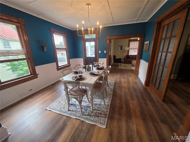 371 Jefferson St, Saint Genevieve, MO 63670 - dining room with a wainscoted wall, a chandelier, dark wood-type flooring, wooden walls, and crown molding