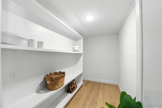 15282 Springrun Dr, Chesterfield, MO 63017 - mudroom featuring light wood-style floors and wooden walls