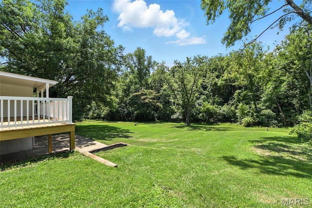 15282 Springrun Dr, Chesterfield, MO 63017 - view of grassy yard featuring a deck