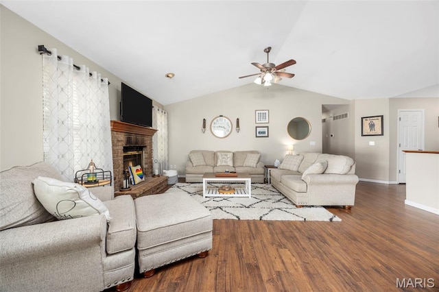 182 Cherrywood Parc Dr, Ofallon, MO 63368 - living area with ceiling fan, lofted ceiling, wood finished floors, and a fireplace