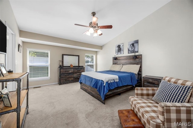 182 Cherrywood Parc Dr, Ofallon, MO 63368 - carpeted bedroom featuring multiple windows, vaulted ceiling, and ceiling fan