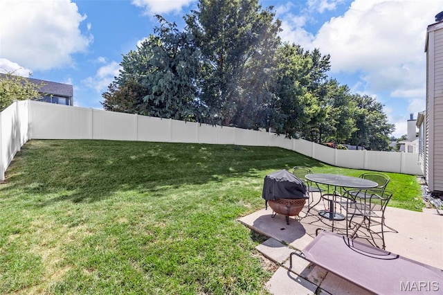 182 Cherrywood Parc Dr, Ofallon, MO 63368 - fenced backyard featuring a patio and an outdoor fire pit