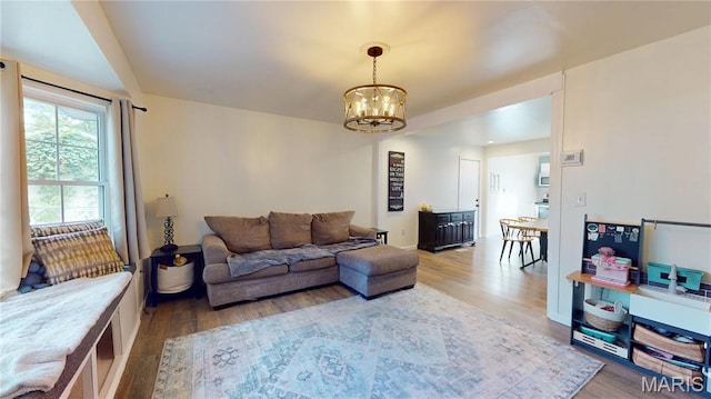 224 Lucinda Dr, Fairview Heights, IL 62208 - living room featuring a chandelier and wood finished floors