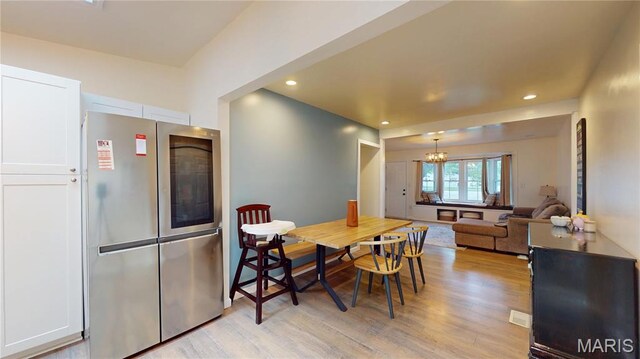 224 Lucinda Dr, Fairview Heights, IL 62208 - dining area with light wood-style floors, a chandelier, and recessed lighting