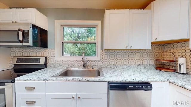 224 Lucinda Dr, Fairview Heights, IL 62208 - kitchen featuring stainless steel appliances, white cabinets, backsplash, and light stone countertops