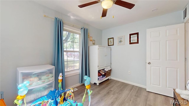 224 Lucinda Dr, Fairview Heights, IL 62208 - recreation room featuring light wood-style floors and a ceiling fan