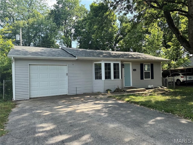 224 Lucinda Dr, Fairview Heights, IL 62208 - ranch-style home featuring asphalt driveway, a garage, and a shingled roof