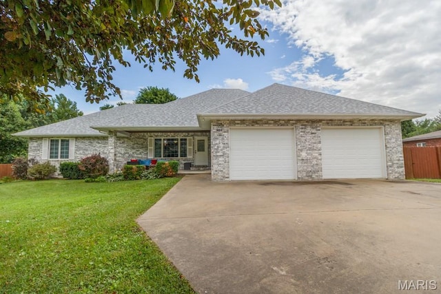 1124 Carpentry Cir, Lebanon, MO 65536 - ranch-style house featuring a garage, concrete driveway, roof with shingles, and brick siding