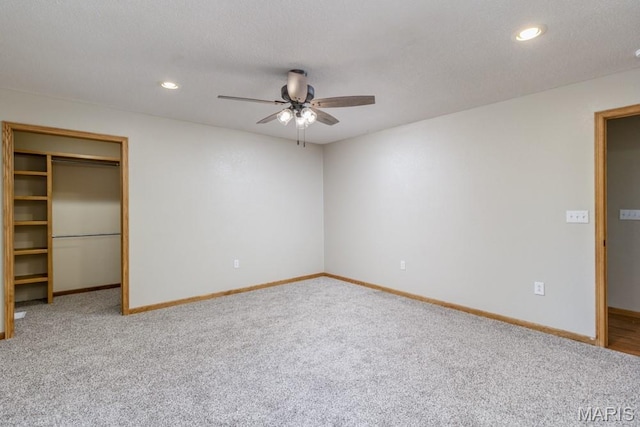 1124 Carpentry Cir, Lebanon, MO 65536 - unfurnished bedroom featuring carpet, a spacious closet, recessed lighting, a ceiling fan, and a closet