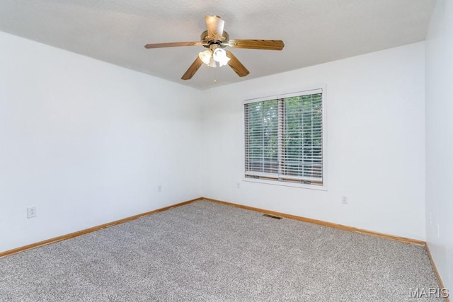 1124 Carpentry Cir, Lebanon, MO 65536 - spare room with carpet flooring and a ceiling fan
