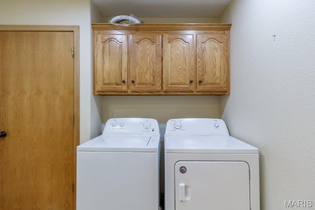 1124 Carpentry Cir, Lebanon, MO 65536 - washroom with washer and clothes dryer and cabinet space