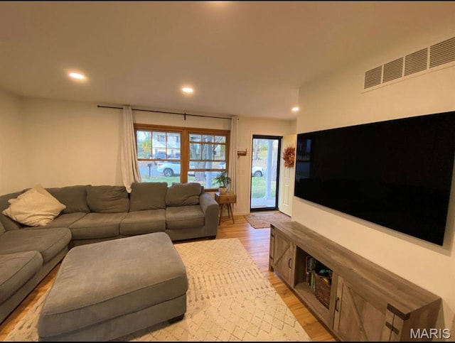 1322 Highland Dr, Rolla, MO 65401 - living area featuring light wood-type flooring and recessed lighting