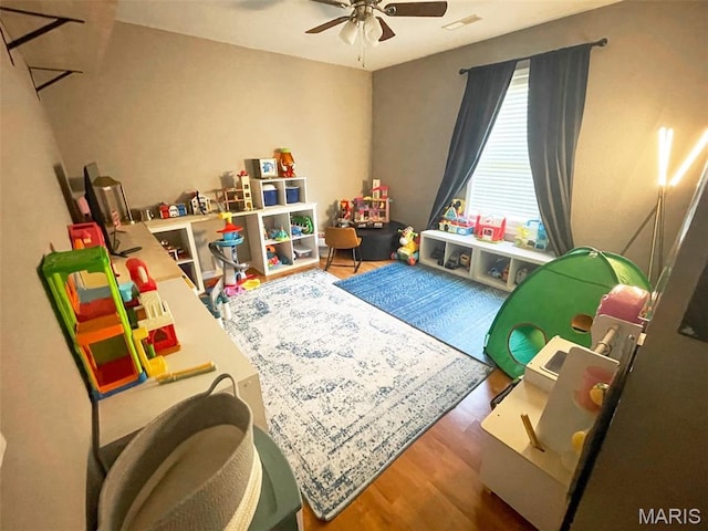712 W Oak St, Dexter, MO 63841 - game room featuring wood finished floors and a ceiling fan