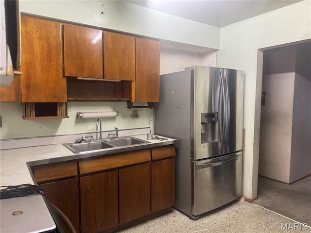 3148 Davis Ave, Granite City, IL 62040 - kitchen featuring stainless steel refrigerator with ice dispenser, light countertops, and brown cabinetry