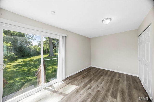 1237 Fairview Ave, University City, MO 63130 - unfurnished bedroom featuring wood finished floors and a closet