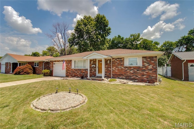 971 Cedar Dr, Wood River, IL 62095 - single story home featuring an attached garage, concrete driveway, and brick siding