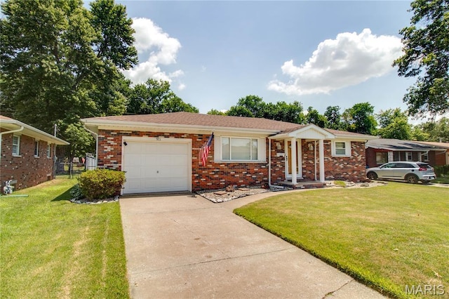 971 Cedar Dr, Wood River, IL 62095 - ranch-style house with brick siding, a front lawn, concrete driveway, and an attached garage
